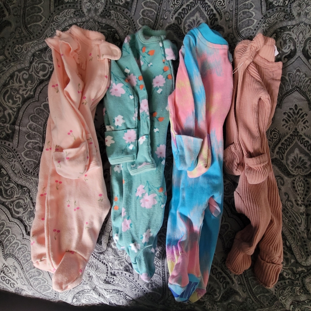 Four Sets Of Newborn Footies.